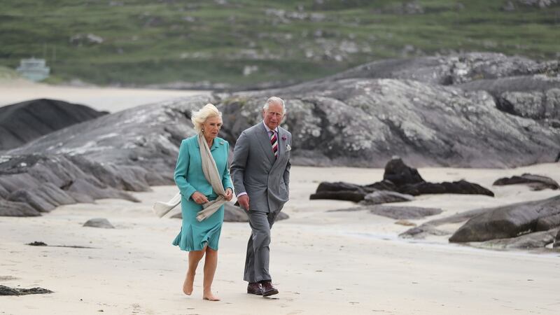 The Prince of Wales and Duchess of Cornwall walk on Derrynane beach in Co Kerry during the royal tour of the Republic of Ireland. Photograph: Niall Carson/PA