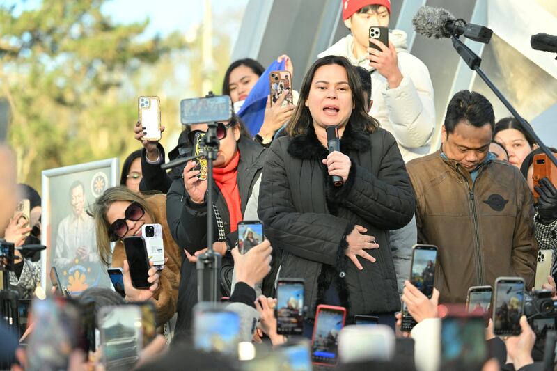 Philippines vice-president Sara Duterte addresses supporters of her father, former president Rodrigo Duterte, outside the International Criminal Court in The Hague on Friday. Photograph: Nicolas Tucat/AFP via Getty Images
