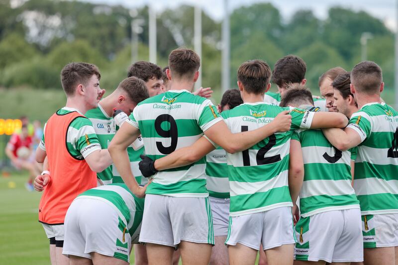 Round Towers players discuss adapting to experimental rules against Fingalians. Photograph: Alan Betson

