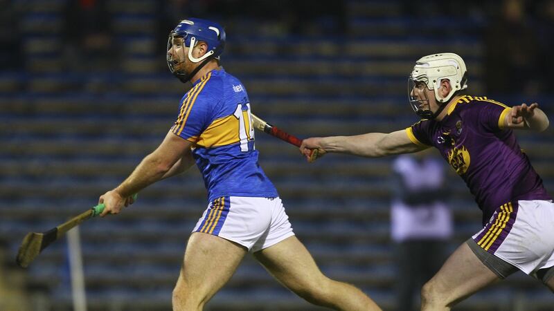 Tipperary’s Jason Forde scores a goal while under pressure from Wexford’s Liam Ryan during the Allianz Hurling League Division 1A match at Semple Stadium in Thurles. Photograph: Ken Sutton/Inpho