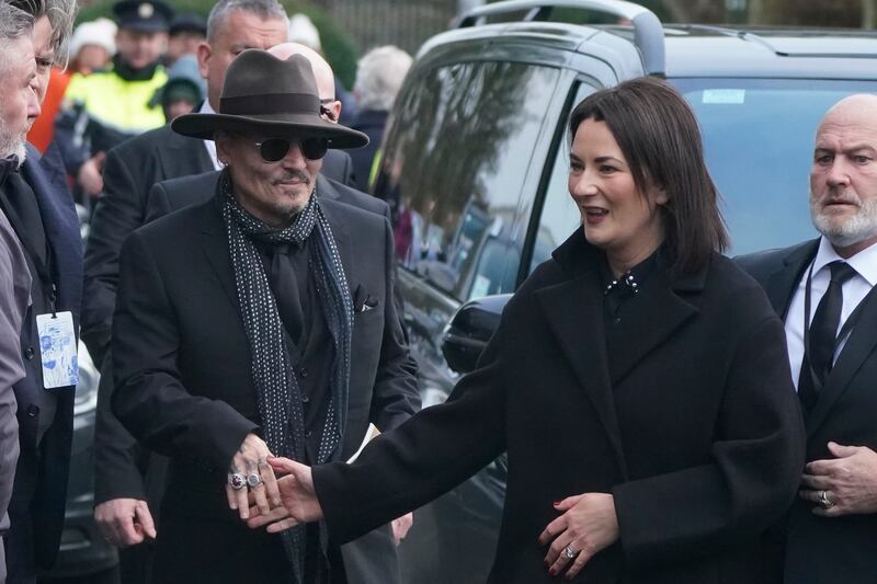 Johnny Depp arrives for the funeral of Shane MacGowan in Nenagh. Photograph: Niall Carson/PA