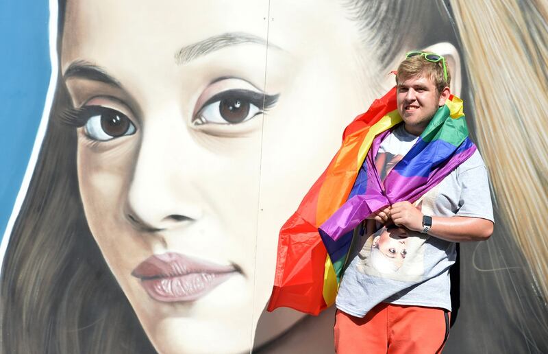 Manchester Pride: a mural of Ariana Grande was painted on a hoarding in the city for the festival. Photograph: Peter Powell/Reuters
