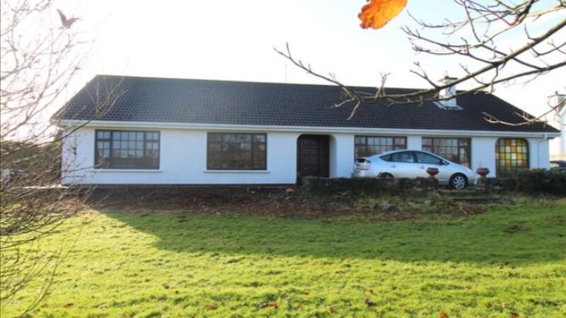 Rustic Lodge, a four-bedroom bungalow in Kilcully, White’s Cross, Co Cork