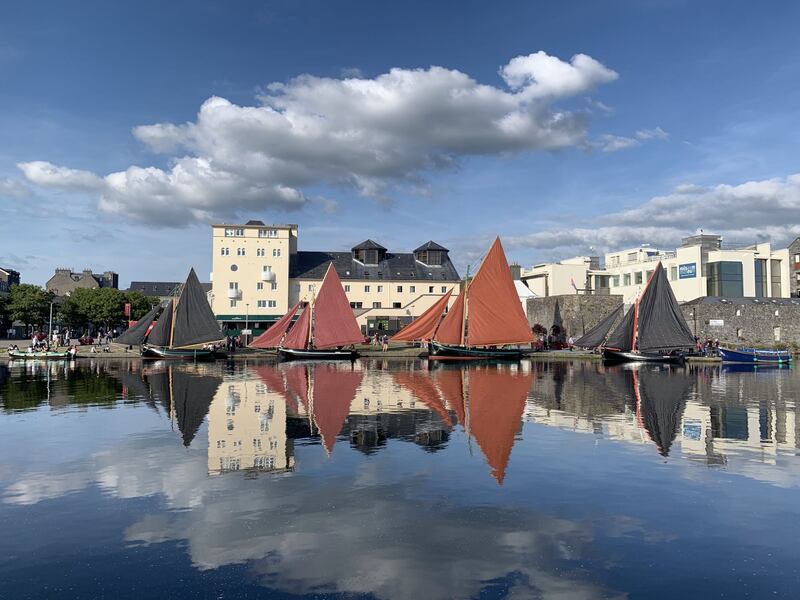 Four Galway hookers at the Spanish Arch. Photograph: John Cunningham