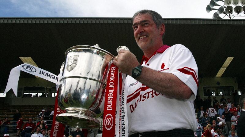 Mickey Harte celebrates Tyrone’s Ulster Championship win in 2003. Photograph: Andrew Paton/Inpho