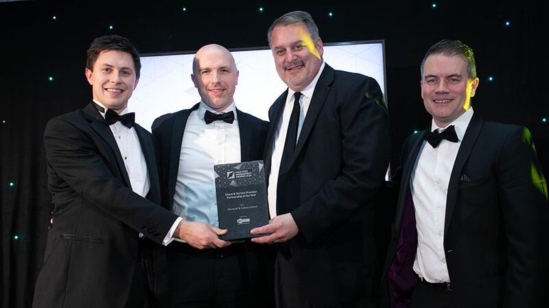Derek O’Boyle, MKF General Manager presents the Client & Service Provider Partnership of the Year award to the Microsoft & Sodexo team.