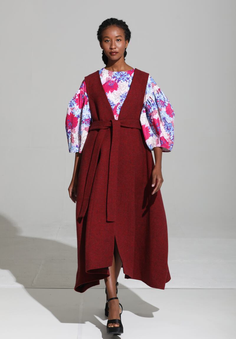 Ejay Griffin: A-line red Irish tweed dress (€695) worn over purple and pink floral print dress (€388)