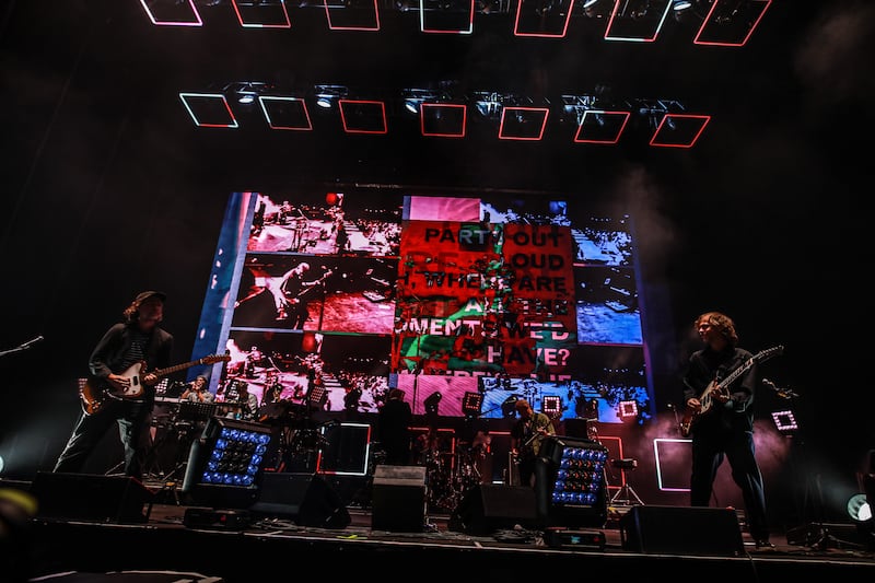 DUBLIN, IRELAND - SEPTEMBER 21: Aaron Dessner, Matt Berninger & Bryce Dessner of The National performs at The 3Arena Dublin on September 21, 2023 in Dublin, Ireland. (Photo by Debbie Hickey/Getty Images)