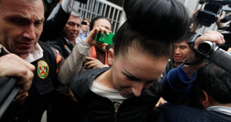 Michaella McCollum Connolly escorted by  police in Peru last August. Photograph: Mariana Bazo/Reuters