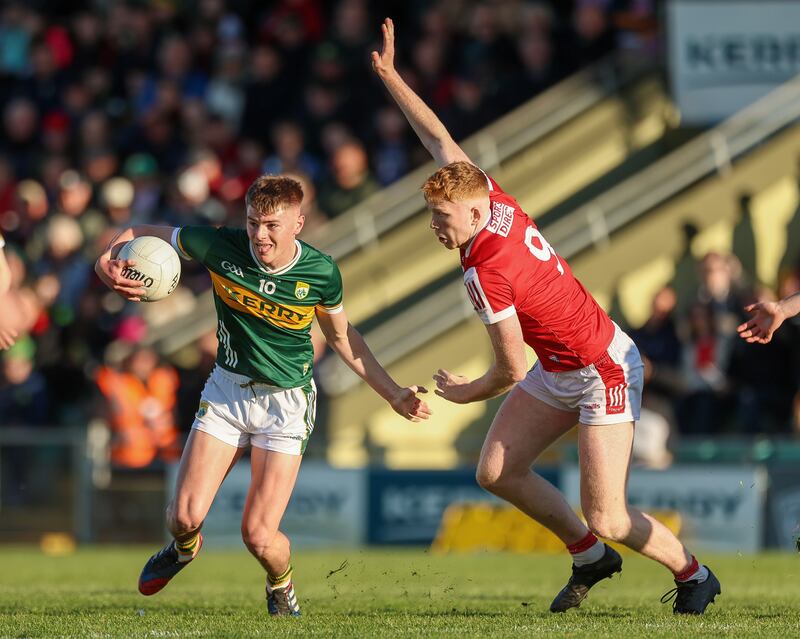 Daniel Kirby of Kerry in action against Michael McSweeney of Cork. Photograph: Natasha Barton/Inpho