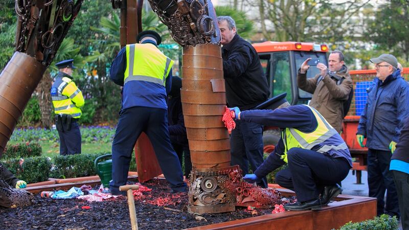 Attempts to clean the vandalised Hautings Soldier sculpture are underway  in St Stephens Green, Dublin. Photograph: Gareth Chaney/Collins