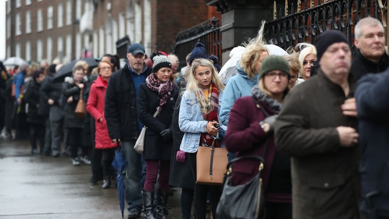 People queue to pay their respects to  Dolores O’Riordan at St Joseph’s Church in Limerick. Photograph: Niall Carson/PA