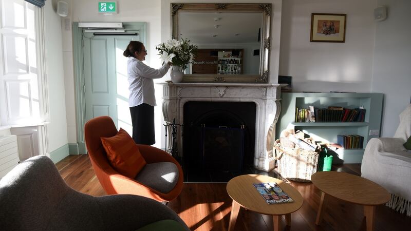 Staff at work in  the Manor House hotel on Rathlin Island. Photograph:  Colm Lenaghan/Pacemaker Press