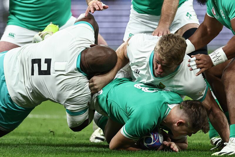 Ireland's tighthead prop Tadhg Furlong is tackled by South Africa's hooker Bongi Mbonambi during their World Cup pool B match. Photograph:  Franck Fife/AFP