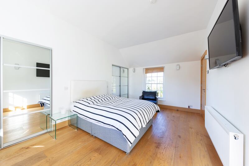 Bedrooms are spacious and modern.