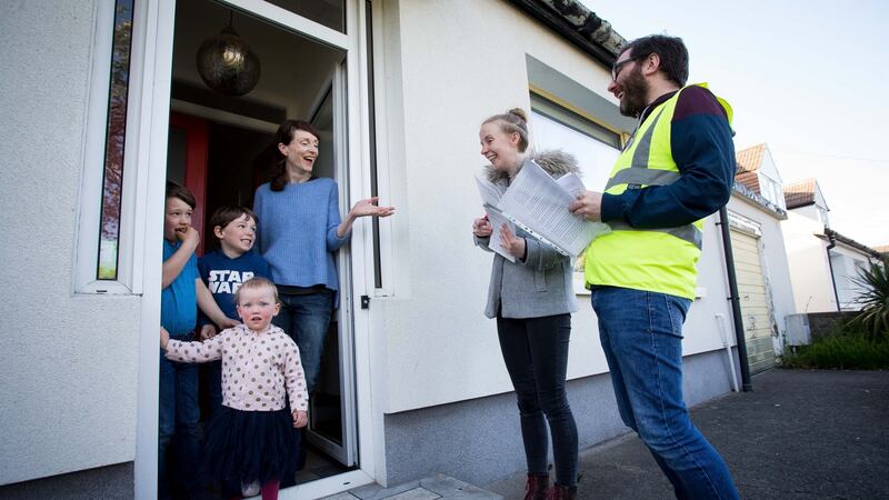 Together For Yes canvassers Sarah Halpin and Paddy Delaney in Perrystown, Dublin 12, speak to Pauline Fleming, with her children, Cohen Heenan (8), Ailbe Heenan (5) and Ruby Heenan (2). Photograph:  Tom Honan