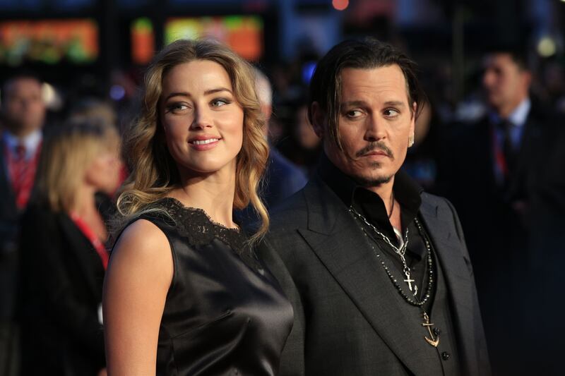 Amber Heard and Johnny Depp attending the premiere of Black Mass at the Odeon Leicester Square, London in 2015.