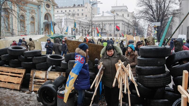 Mikheil Saakashvili supporters set up a barricade in their tent camp near of parliament building in Kiev, Ukraine. Photograph: Stepan Franko/EPA