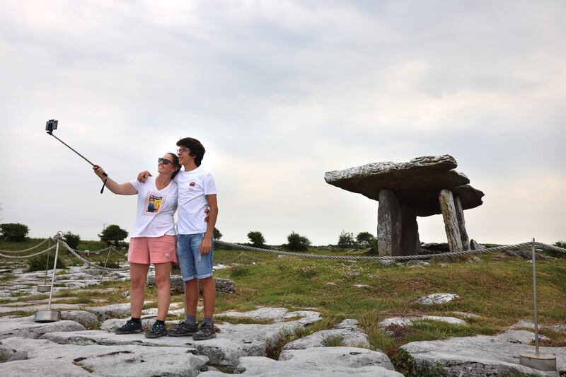 Tourists at Poulnabrone Dolmen. Photograph: Dara Mac Dónaill