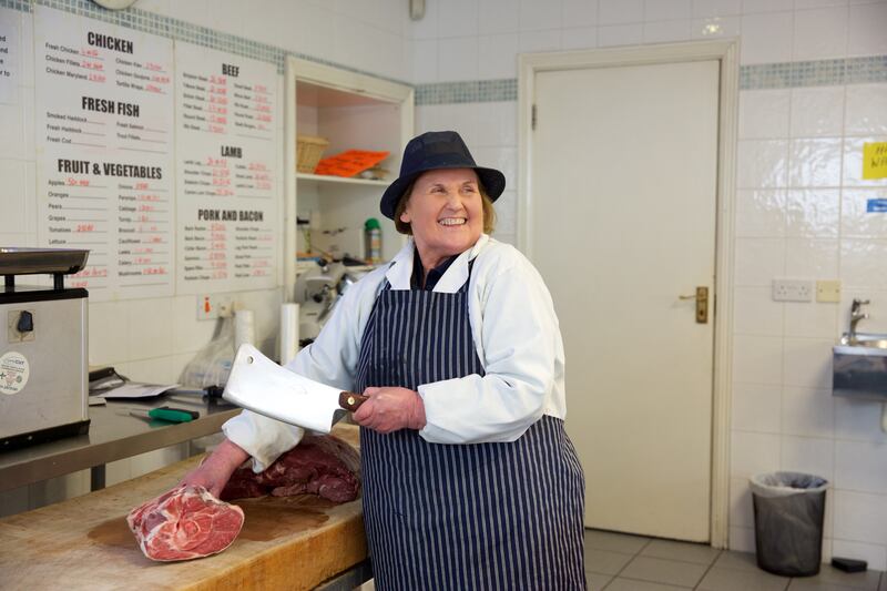 Butcher Sarah Thornton at work in Manorhamilton. 'People don’t have as much time to chat these days naturally because it takes two people to pay a mortgage.' Photograph: Brian Duignan