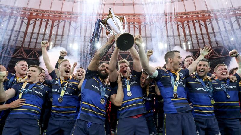 Isa Nacewa and Jordi Murphy lift the European Rugby Champions Cup trophy. Photograph:   Dan Sheridan/Inpho