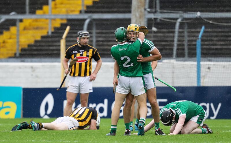 Limerick's Dan Morrissey celebrates at the final whistle with Sean Finn. Photograph: Tommy Dickson/Inpho