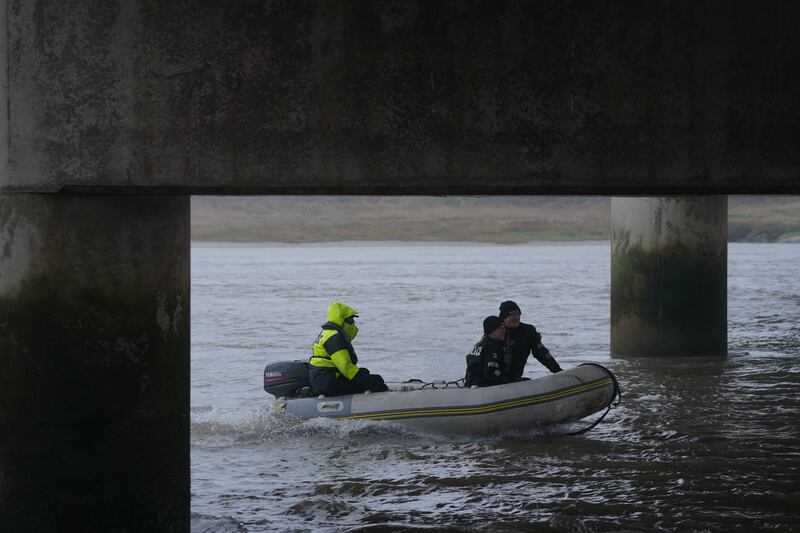 The police search and rescue team under the Shard Bridge on the river Wyre. Photograph: PA