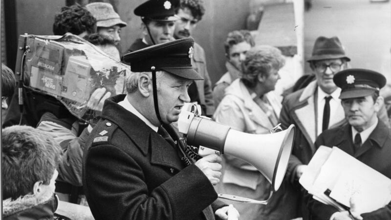 A Garda directs operations during a search of the Dublin Mountains for Philip Cairns in November 1986. File photograph: Tom Lawlor/The Irish Times