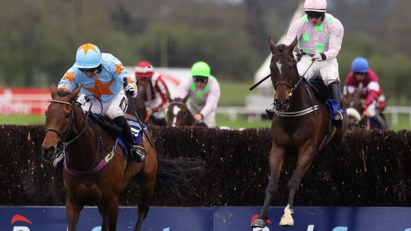 Patrick Mullins on Un De Sceaux comes home to win ahead of Paul Townsend onboard Douvan in the Boylesports Champion Chase at Punchestown. Photograph: Lorraine O’Sullivan/Inpho