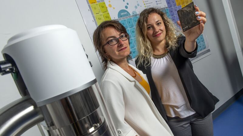 Dr Maria Mc Namara, Senior Lecturer and Valentina Rossi, PhD student with a fossil sample at the School of Biological, Earth and Envirnomental Sciences UCC. Photograph: Michael Mac Sweeney