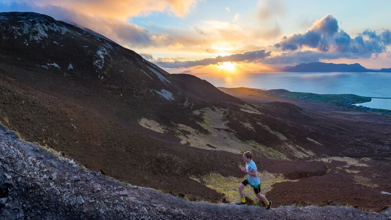 Triathlete Con Doherty running up Croagh Patrick.