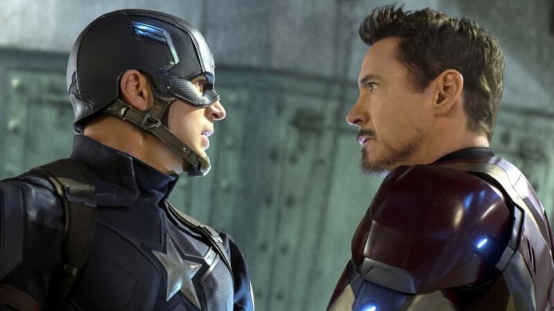 Two tribes: Chris Evans and Robert Downey Jr in Captain America: Civil War. Photograph: Film Frame/Marvel