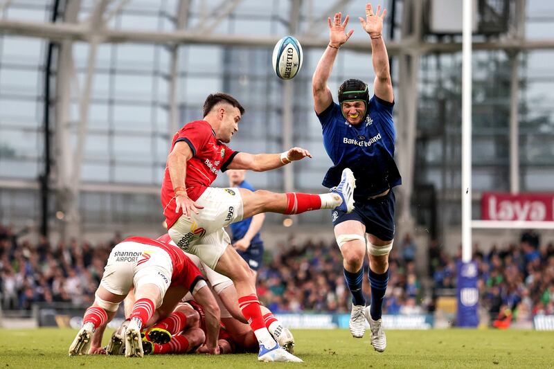 Munster's Conor Murray clears the ball despite Ryan Baird of Leinster. Photograph: Laszlo Geczo/Inpho
