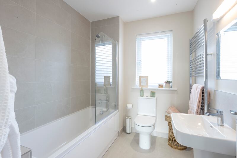 Bathroom sanitary ware is supplied by Sonas, with tiles from Tilespex