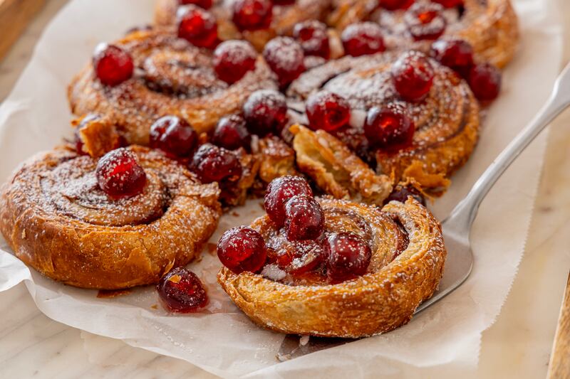 Cinnamon and cherry swirl traybake. Photograph: Harry Weir Photography