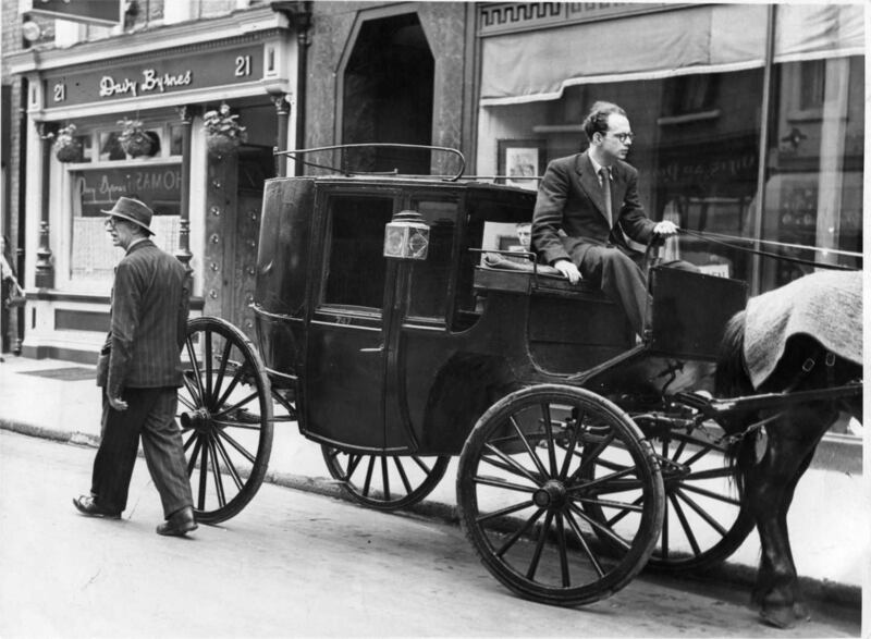 Poet Patrick Kavanagh, left, and Anthony Cronin on Bloomsday, June 16th, 1954, outside Davy Byrne’s. Photograph: Dermot Barry