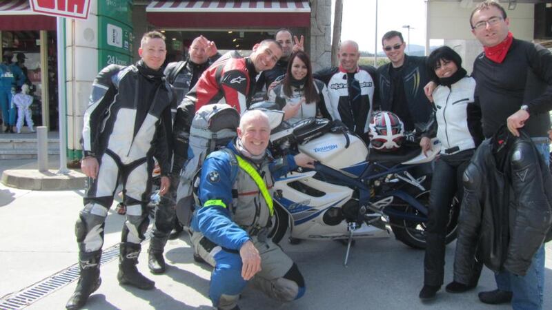 Peter Murtagh (centre) with “jolly French bikers”.