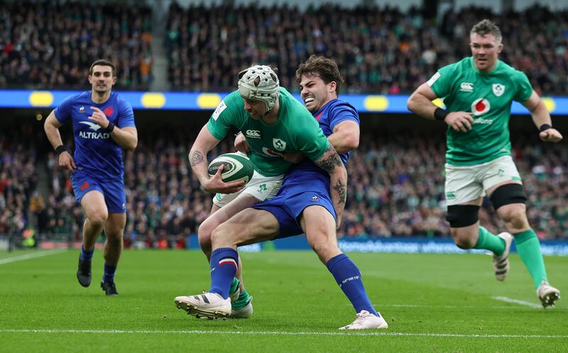 Antoine Dupont prevents Mack Hansen from scoring a try during last year's Six Nations. Photograph: David Rogers/Getty Images