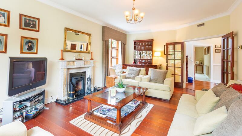 The main reception room has a feature fireplace