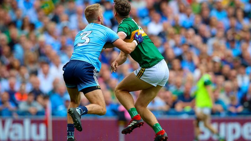 Jonny Cooper fouls David Clifford under a high ball lading to Kerry’s missed penalty. Photograph: Tommy Dickson/Inpho