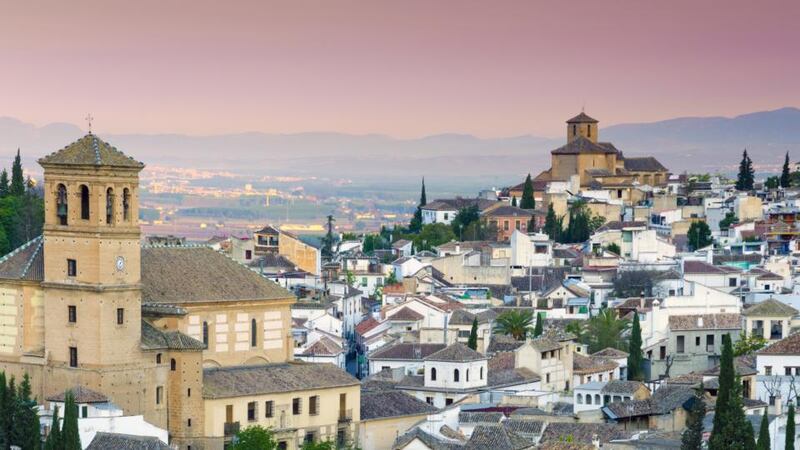 The city of Granada in Spain, from where you get your first glimpse of the long ridge of the Sierra Nevada and the Alpujarras beyond