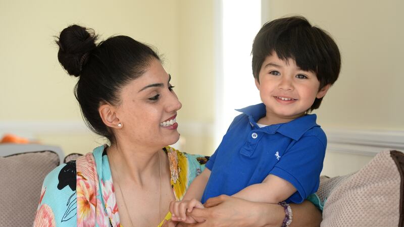 Kuxi Ghai and her son Ishaan Oisin Allen Ghai (3): “My culture is Indian and African, so with us it is that you have been given this gift and your job is to journey with them until they can go it alone.” Photograph: Dara Mac Dónaill