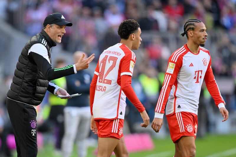 Munich coach Thomas Tuchel speaks with Jamal Musiala and Leroy Sane. Photograph: Sebastian Widmann/Getty Images