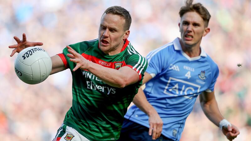 Mayo’s Andy Moran in action against   Michael Fitzsimons of Dublin. Photograph: Tommy Dickson/Inpho