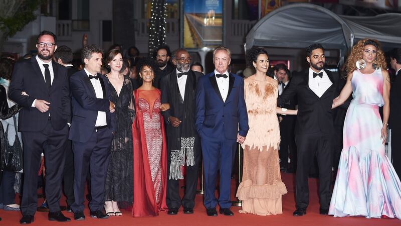 From left, Juliano Dornelles, Kleber Mendonça Filho, Emilie Lesclaux, Danny Barbosa, Wilson Rabelo, Udo Kier, Barbara Colen, Thomas Aquino and Silveiro Peirera at the screening of Bacurau. Photograph: Pascal Le Segretain/Getty Images