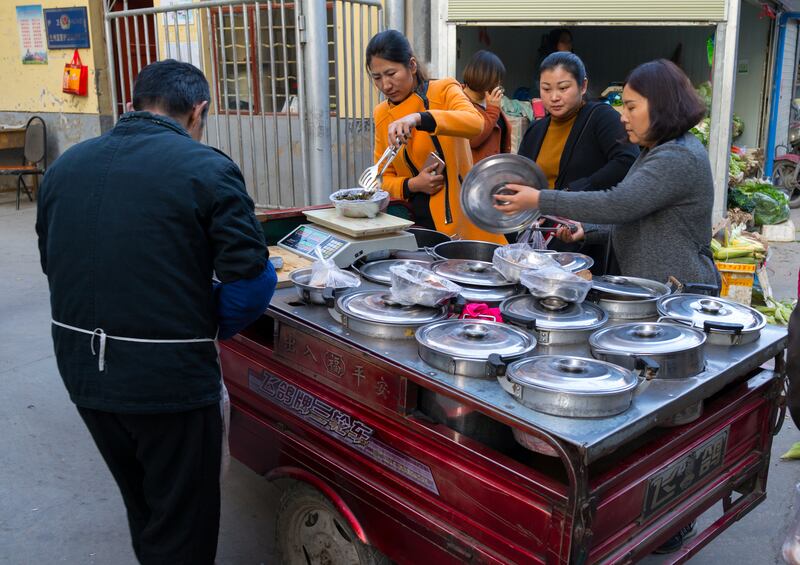 A street food vendor Lanzhou, China on November 2nd Photograph: Eric Lafforgue/Art In All Of Us/Corbis/Getty