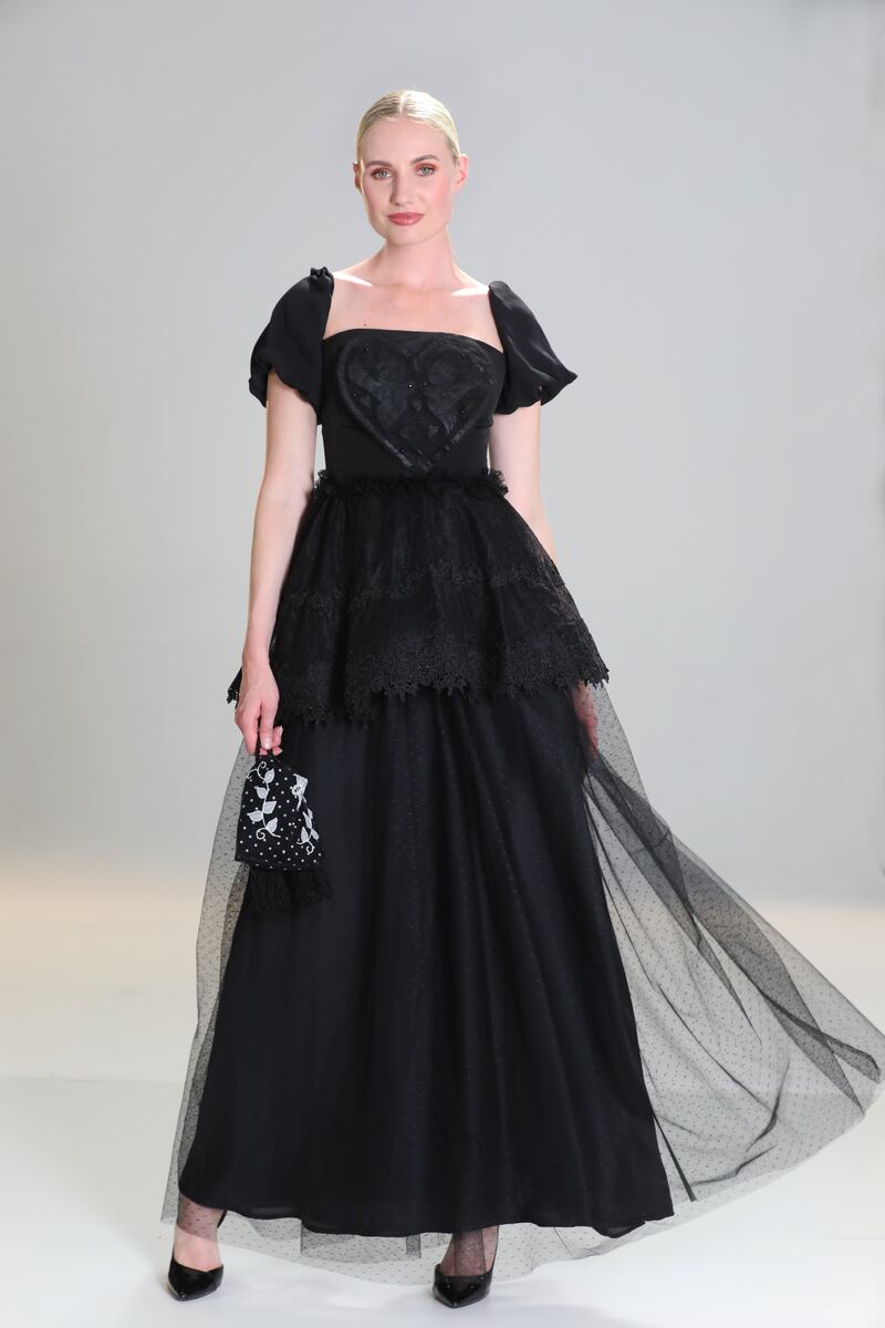 Carrickmacross lace motif gown with lace and silk skirt overlay, €1900, and Carrickmacross pouch, €185, both by Caterina Coyne. Photograph: Sasko Lazarov