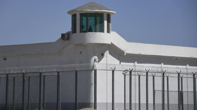 A  watchtower on a high-security facility near what is believed to be a re-education camp where mostly Muslim ethnic minorities are detained, on the outskirts of Hotan in Xinjiang. Photograph: Greg Baker/AFP