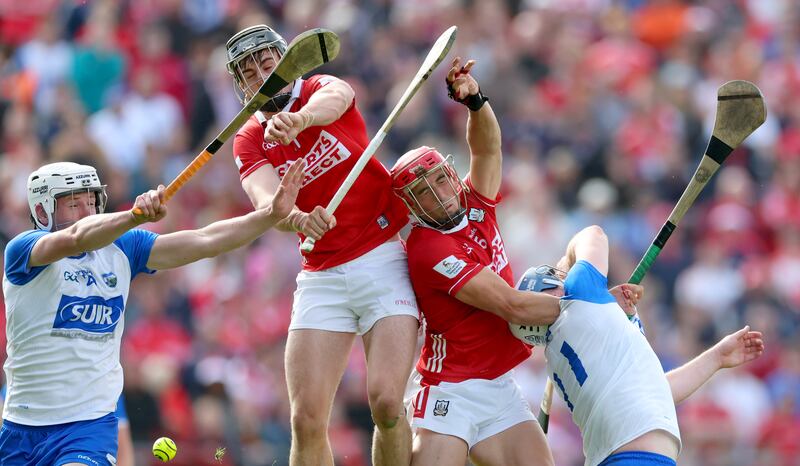 Waterford’s Shane Bennett and Stephen Bennett with Darragh Fitzgibbon and Ciarán Joyce of Cork. Photograph: James Crombie/Inpho