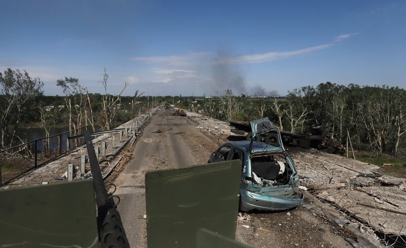 Ukrainian servicemen drive an armoured personnel carrier on a damaged road near the front line in the city of Severodonetsk, Luhansk on June 2nd. Photograph: Stringer/EPA-EFE